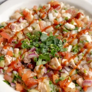 Authentic Sinaloa-style Ceviche de Camaron with fresh shrimp, cucumber, and avocado from Unos Mariscos O Que in Round Rock, TX.